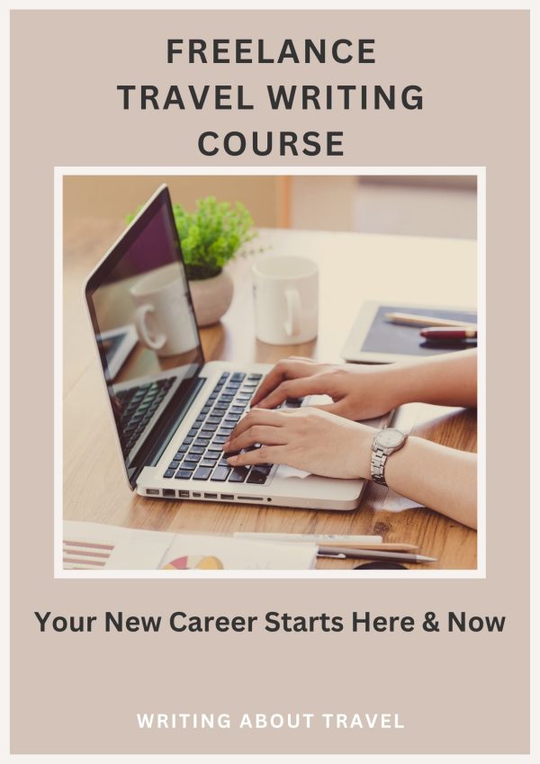 Person typing on a laptop undertaking a freelance travel writing course.